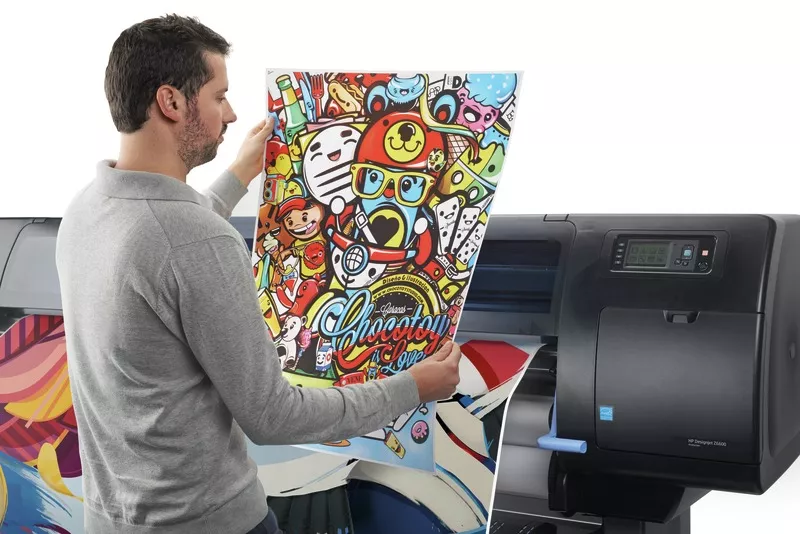 HP Designjet Z6600 Photo Printer man checking colour poster print